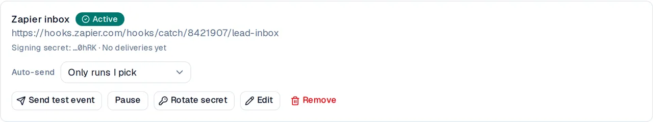 A saved webhook named Zapier inbox with an Active badge, an Auto-send dropdown, and buttons to send a test event, pause, rotate the secret, edit, and remove it.